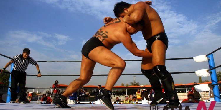 Japanese wrestlers compete