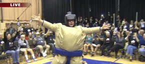 A man wrestles in an inflatable sumo wrestler match for a charity event in Phoenix, Arizona, on Feb. 25, 2016 (picture: KSAZ Fox 10 Phoenix screenshot)