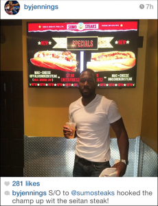 Bryant Jennings at Sumo Steaks taking pleasure in their vegetarian seitan steak.