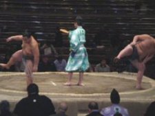 Spectators start to arrive due to the fact middle-ranked sumo wrestlers satisfy in Japan.