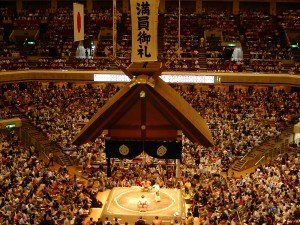 The sumo arenas of today have numerous features of historical importance. One of those could be the canopy above the band, which is modeled on top of a shrine. It signifies that sumo started as a Shinto ritual.